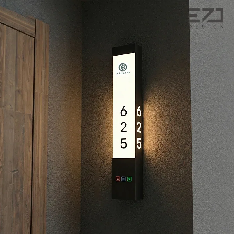 White side-light hotel room sign displayed beside a wood-look door