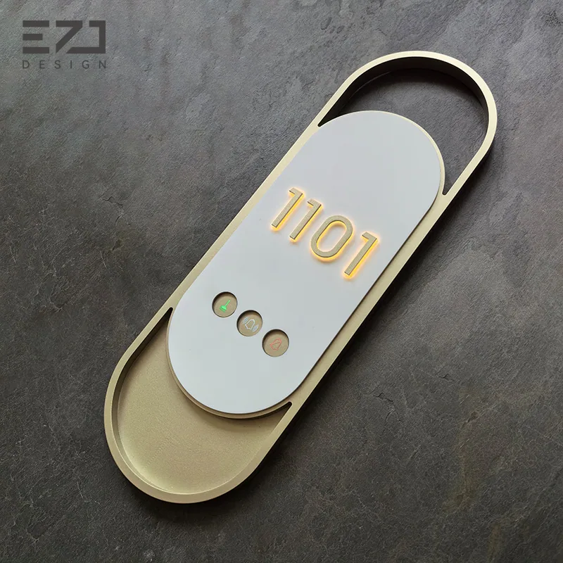 Angled view of an oval contemporary electronic hotel door sign